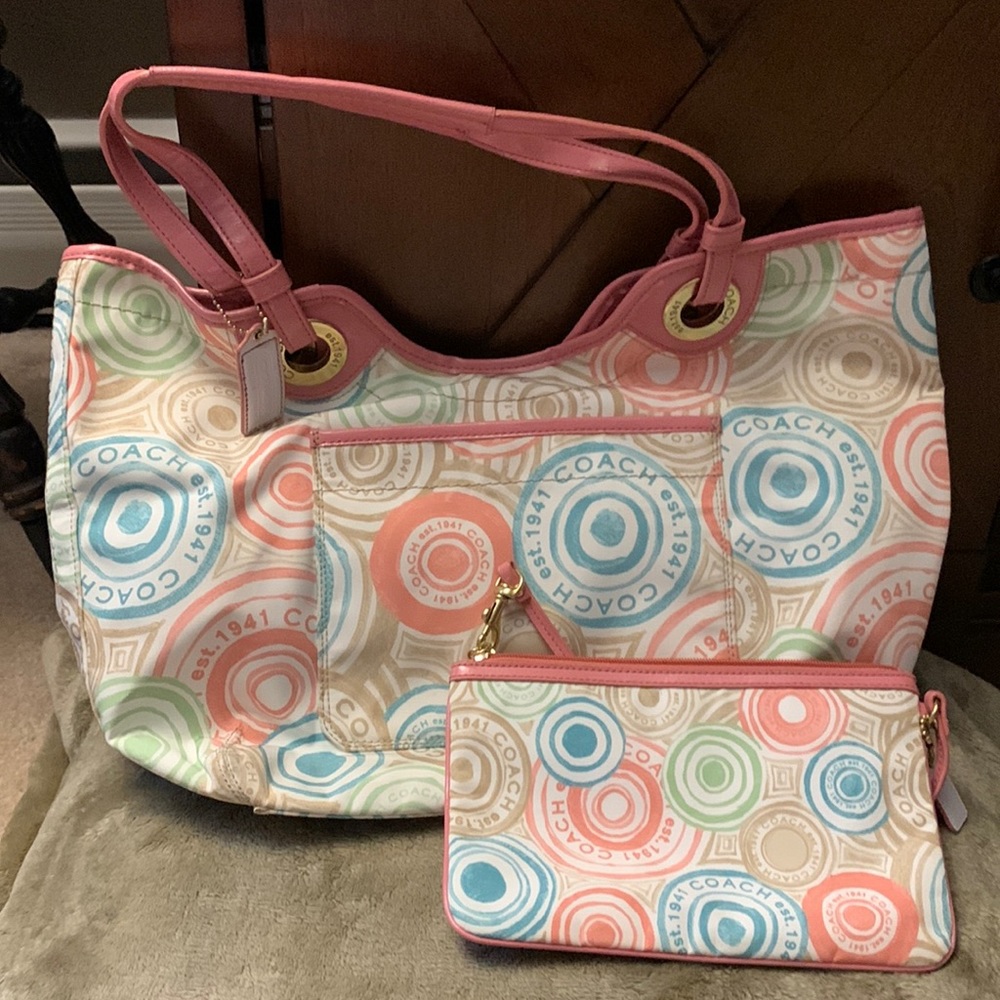 Gently used nylon Coach bag with matching wristlet.